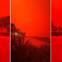 Cielo apocalittico in Australia, il ciclone Narelle tinge tutto rosso sangue: le immagini sono virali