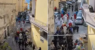 Processione tra i rifiuti: a Torre Annunziata fede umiliata e città abbandonata