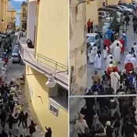 Processione tra i rifiuti: a Torre Annunziata fede umiliata e città abbandonata