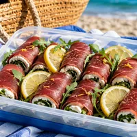 Ricetta del giorno: involtini di bresaola con ricotta, rucola e limone