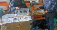 Napoli - Poggioreale, scoperta "stamperia" di articoli di abbigliamento falsi. Otto arresti
