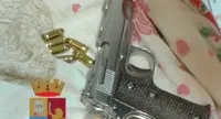 Napoli - Pistola e cartucce trovate in un frigorifero