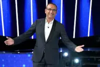 Rai: addio alla tv per Carlo Conti? Il conduttore di Tale e Quale show cambia vita. Ecco cosa è successo