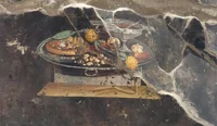 La "pizza" nell'Antica Pompei, da un affresco una nuova scoperta