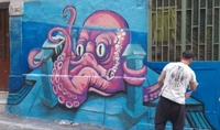 Torre Annunziata - "Murales gentili": inaugurato un murale raffigurante un grosso polipo